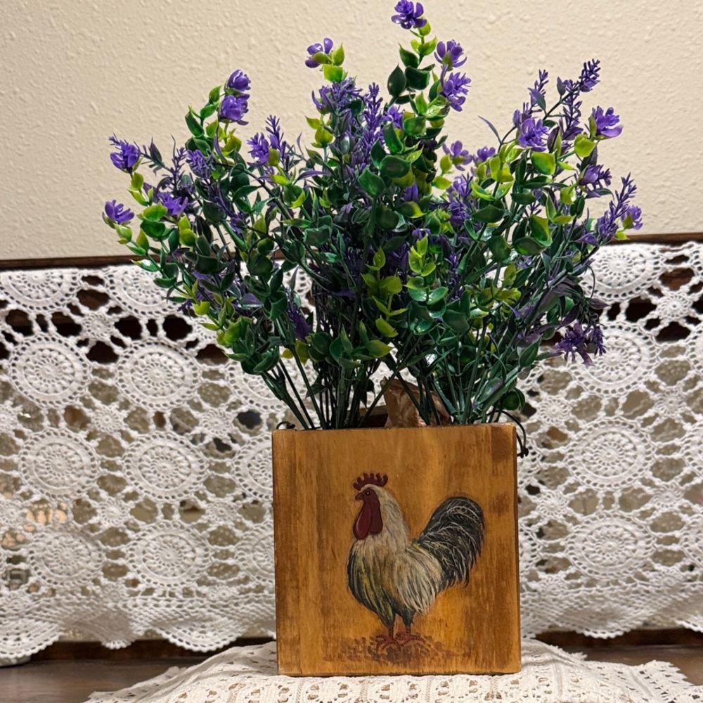 Wooden Container with a rooster holding Purple and Green Faux Flowers. - Picture 2 of 12